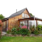 Te koop in de Creuse een houten Chalet met garage en tuin.